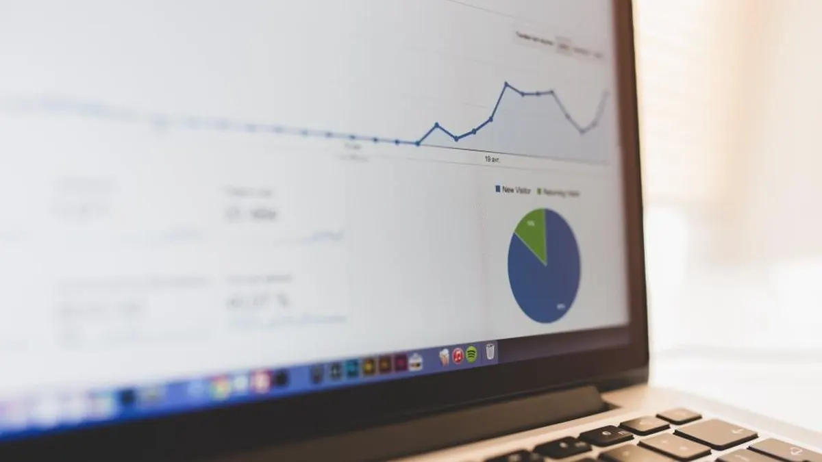 Charts and analytics displayed on a laptop screen