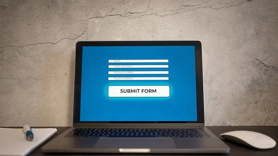 Laptop showing a submit form on screen
